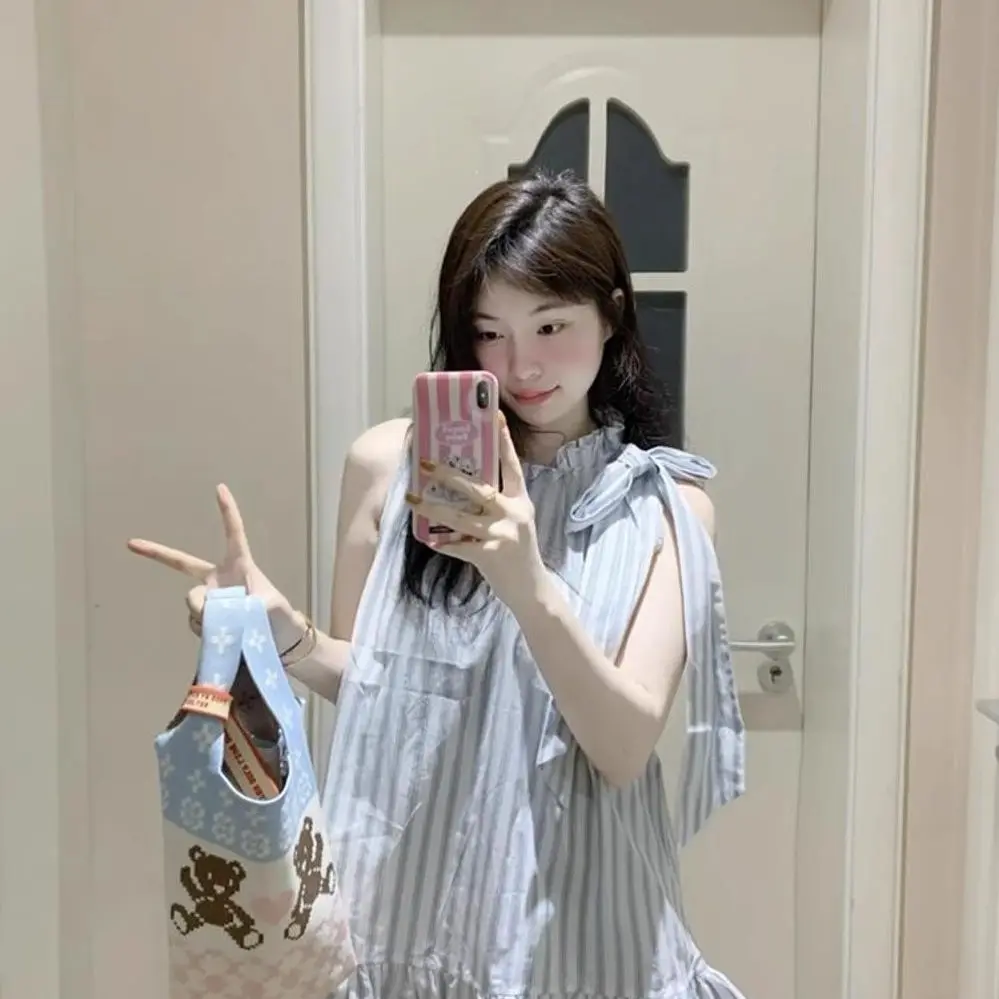 

​​Youthful Striped Bow Tie Top 2025 Summer Sleeveless Smocked Blouse Chic Age-Defying Casual Pullover​​