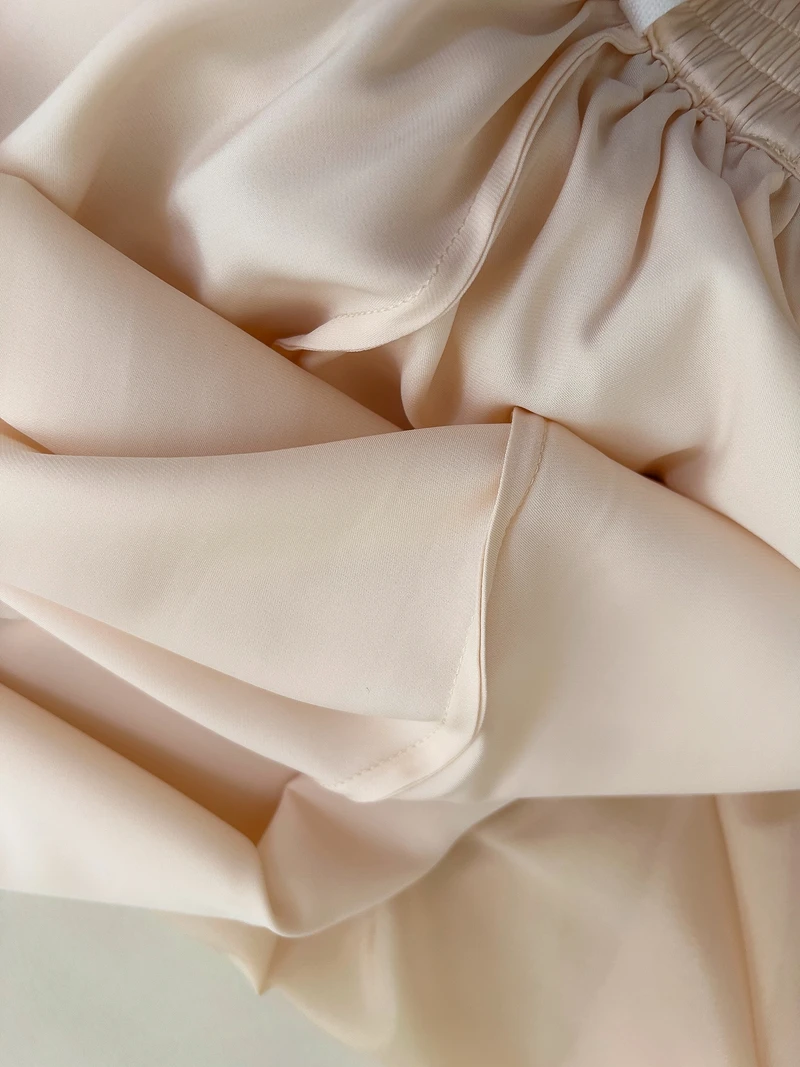 أوائل الخريف 2025 مشمش ناعم طويل Sve متوهج Sve تنورة عالية الخصر مجموعة Ele ملابس داخلية لمطابقة معطف