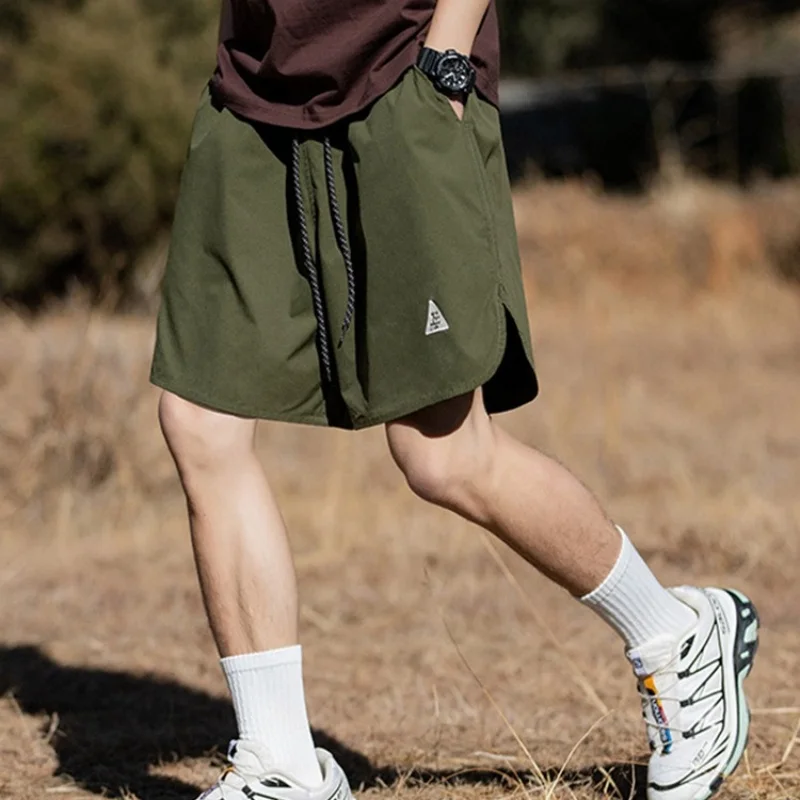 Sports shorts for men, summer split design, beach pants, embroidered casual five quarter pants