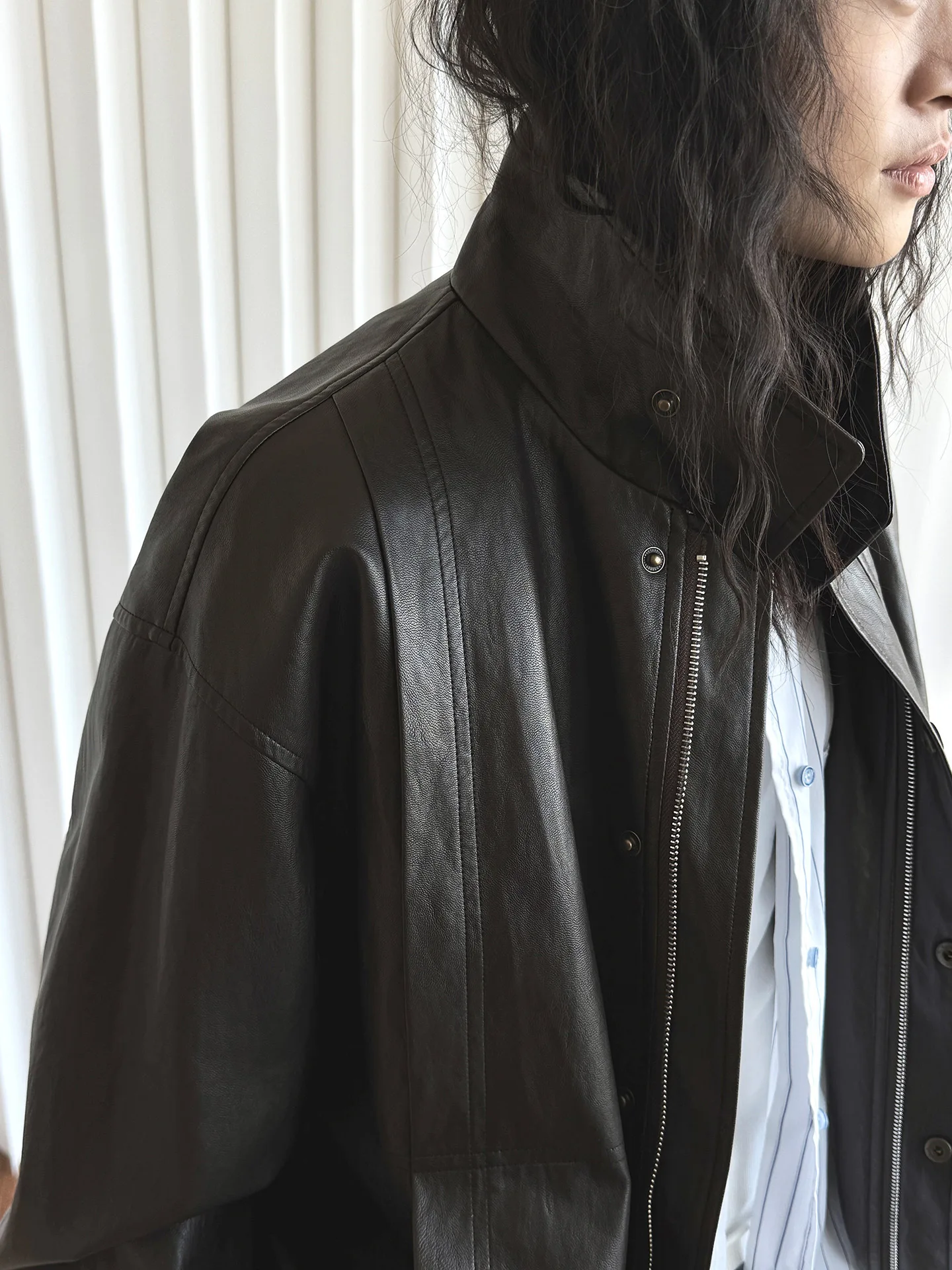 

Spring women's casual solid color stand up collar long sleeved loose PU jacket