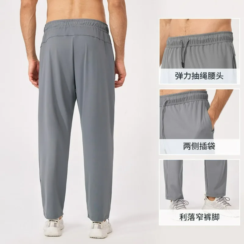 

Men's Loose Sports Pants Elastic Breathable Fitness Pocket Outdoor Leisure Running Training Lace Up Elastic Pantss