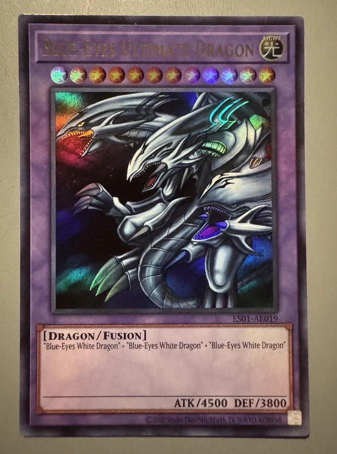 Yugioh KONAMI Duel Monsters ES01-AE019 Blue-Eyes Ultimate Dragon Ultra Rare Asian English Collection Mint Card