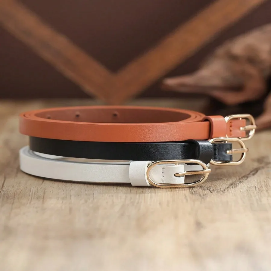 A set of 3 thin waist belts with a simple oval golden buckle, which are versatile.