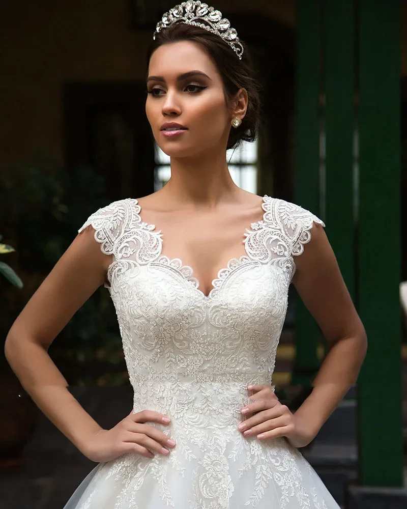 فساتين زفاف Flavinke مخصصة من Vestidos De NoivaTulle فساتين زفاف بأكمام قصيرة فاخرة بأربطة من الخلف رداء رائع De Mariage