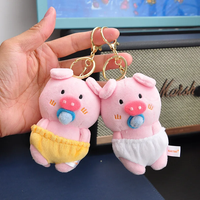 new Cute Two handed pocket inserted pig trendy plush pendant bottle pull-out personalized doll Interesting car accessories phon