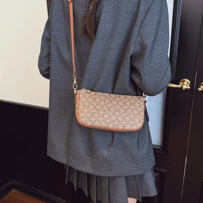 

Высококачественная женская сумка из солнцезащитной кожи с повседневным парижским винтажным стилем