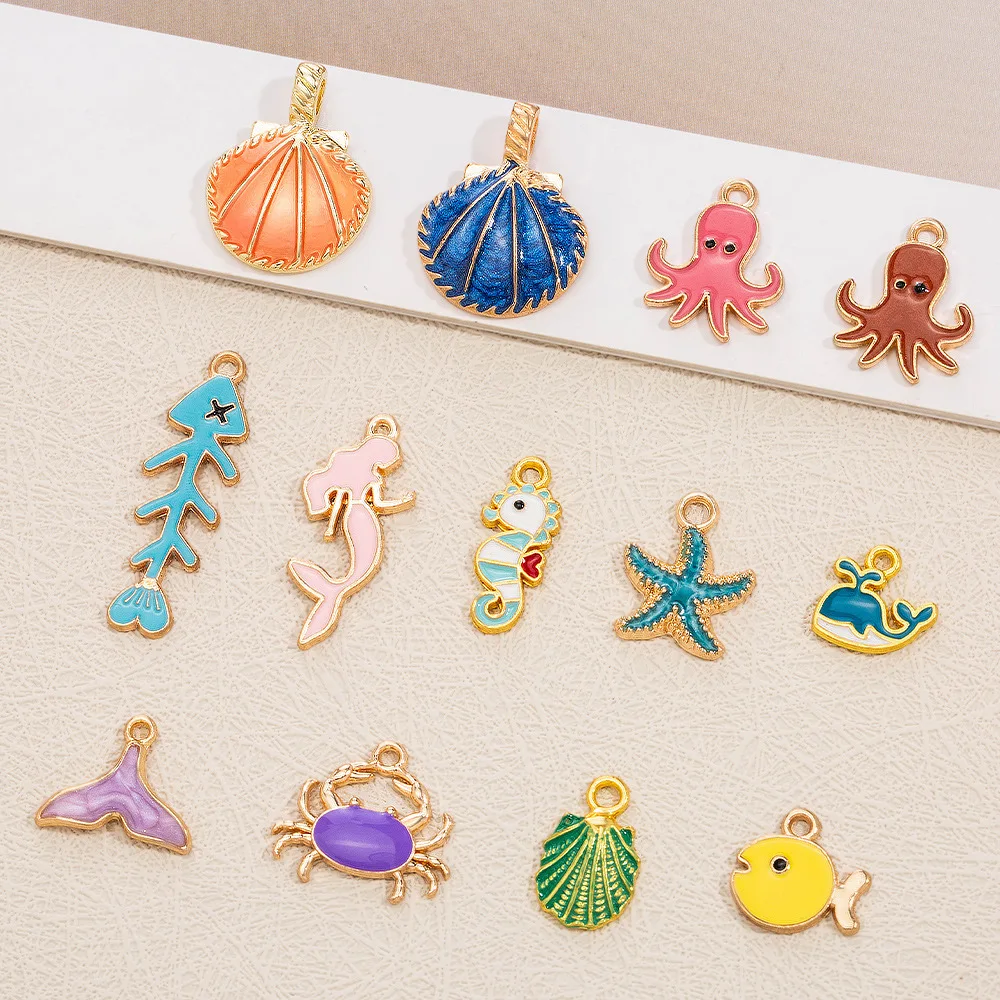 Ciondolo con conchiglia a goccia d'olio, accessorio creativo per braccialetto fai da te, accessorio per gioielli in lega di cartoni animati a sirena