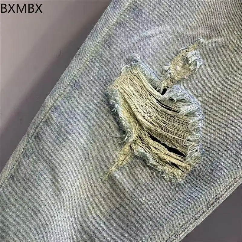سراويل جينز ممزقة على شكل فراشة مطرزة للسيدات سراويل هارلان غير رسمية 100 كجم سراويل كبيرة الحجم فضفاضة ورقيقة للأب