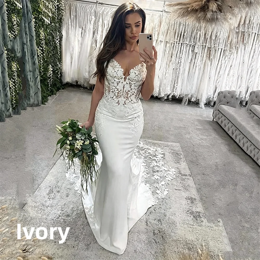 Elegant Mermaid Wedding Dress Spaghetti Straps Deep V Neck Lace Appliques Backless Buttons Chapel Train Satin Bridal Gown Custom