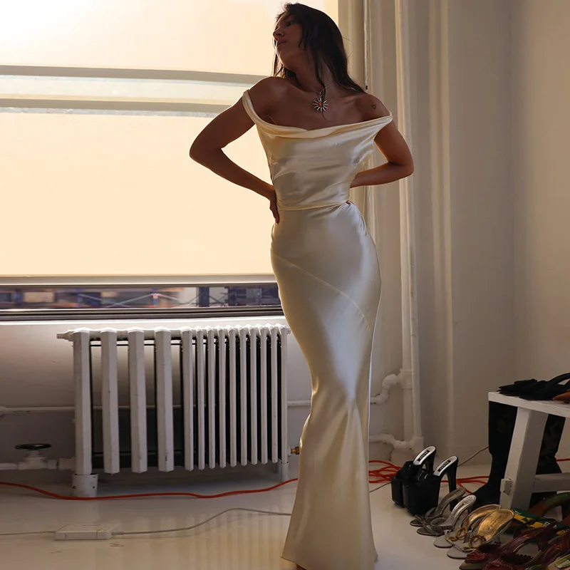 Vestido veraniego sin espalda de satén de moda francesa transfronteriza, vestido Sexy con cuello de una línea y falda larga que abraza la cadera