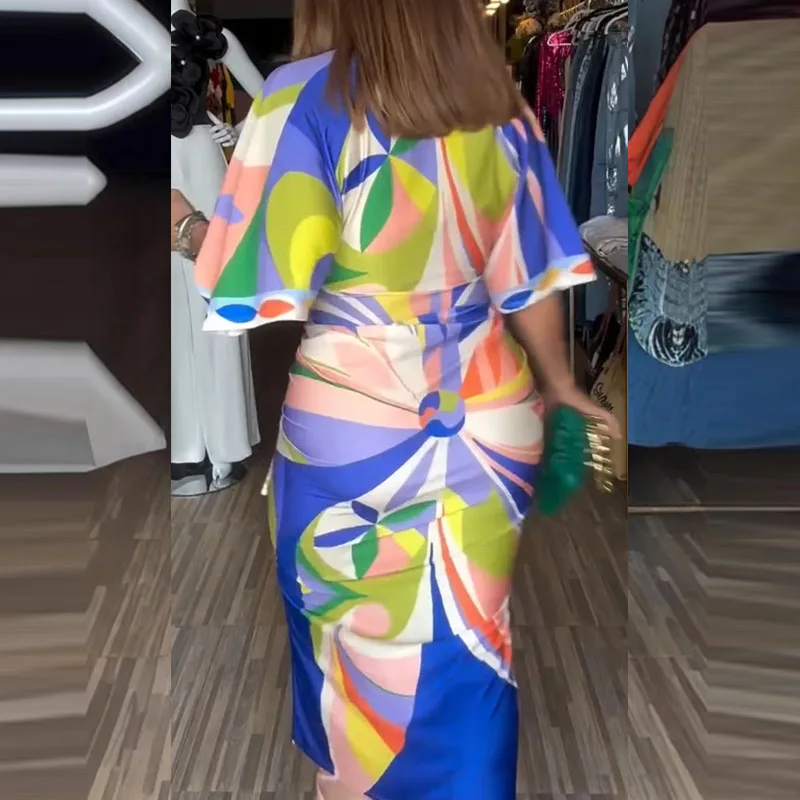 เดรสแฟชั่นสีสันตัดกัน แขนครึ่งตัว ทรงวี คอวี เอวสูง กระโปรงทรงห่อสะโพก ดีไซน์ผ่าข้าง ทรงเข้ารูป ยาว เหมาะสำหรับงานเลี้ยง