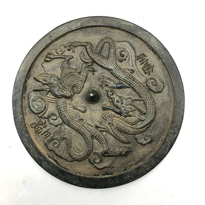 Antique decoration of bronze mirror with Double Dragons in the Warring States Period