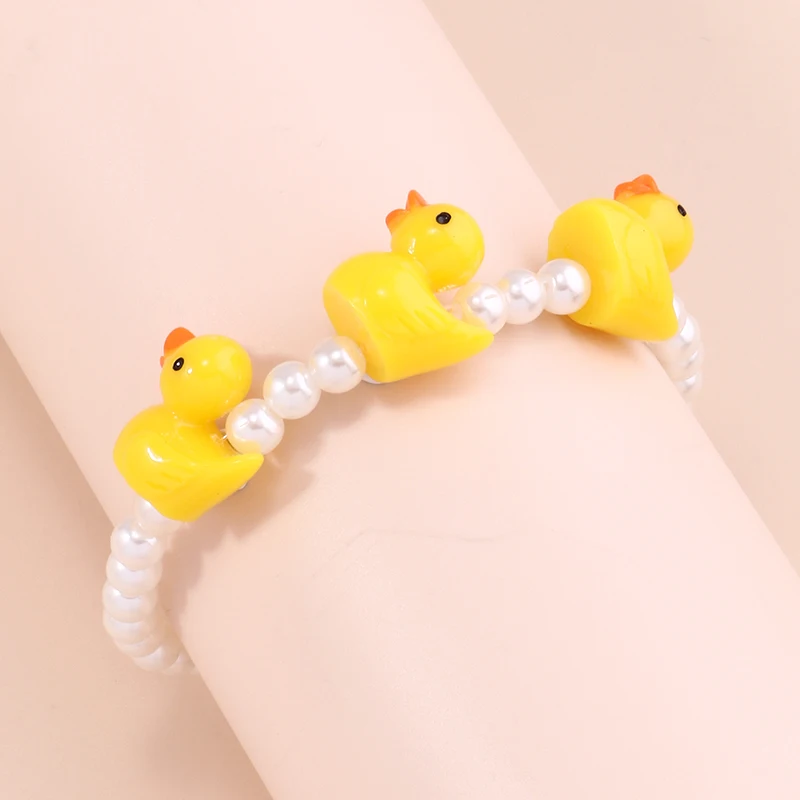 Niedliche handgemachte Imitationsperlen-Armbänder für Frauen, Cartoon-gelbe Ente, Charms-Armbänder, Schmuck, DIY-Geburtstagsparty-Geschenke – Detail 3