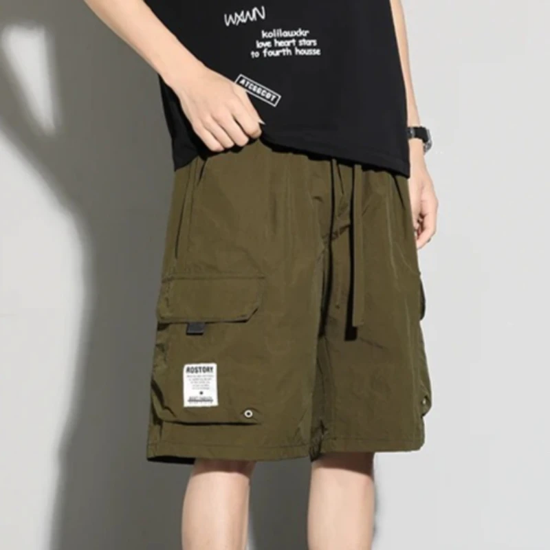 Koreanische High-Street-Cargo-Shorts für Herren, leicht, atmungsaktiv, einfarbig, Kordelzug an der Taille, große Taschen, kurze Sommerhose