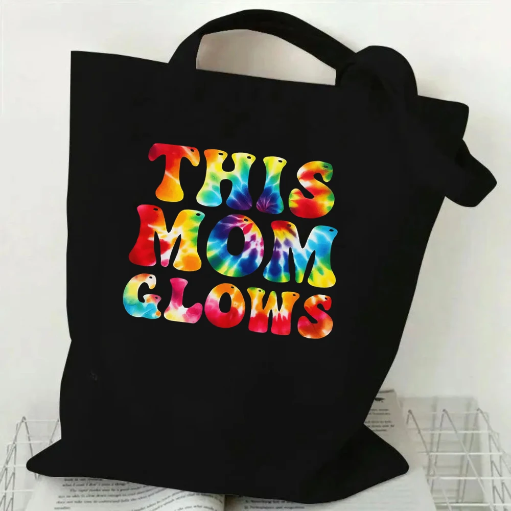 

This Mom Glows Tote Bag, Tie-Dye Colorful Lettering Canvas Bag, Reusable Shopping Tote for Vibrant Moms
