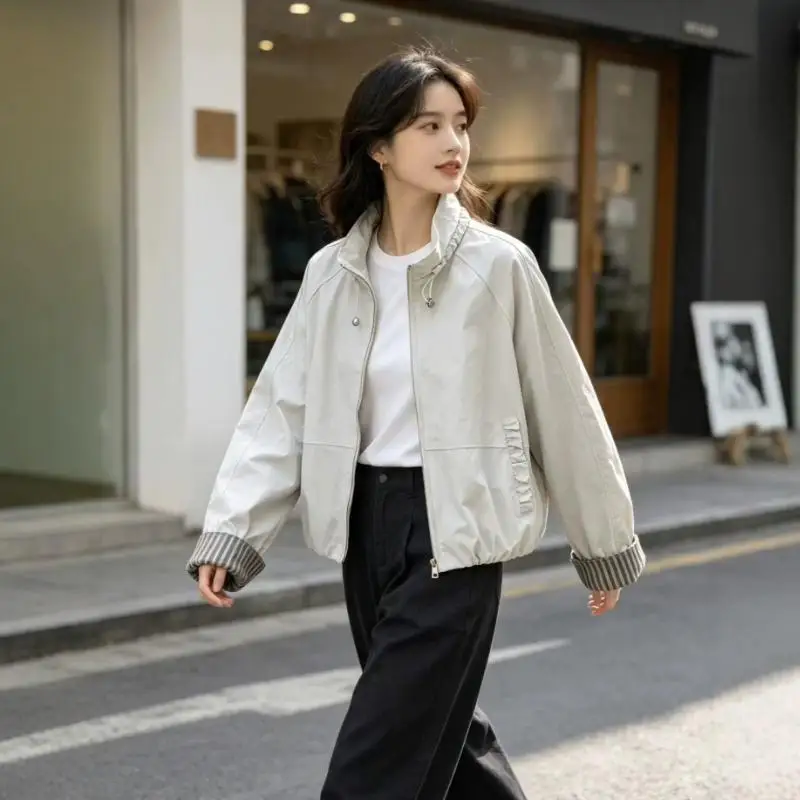 Hot 2026 Springautumn New Women Clothing Simple Fashion Niche Stand Up Collar Coat Popular Design Sense Loose Casual Jacket Tops