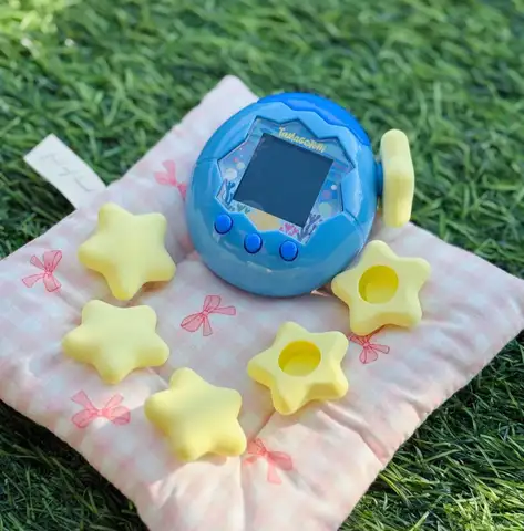 Tamagotchi Uni Paradise Electronic Pet Toy With Silicone Protective Cover In Red Green Apple Strawberry Designs