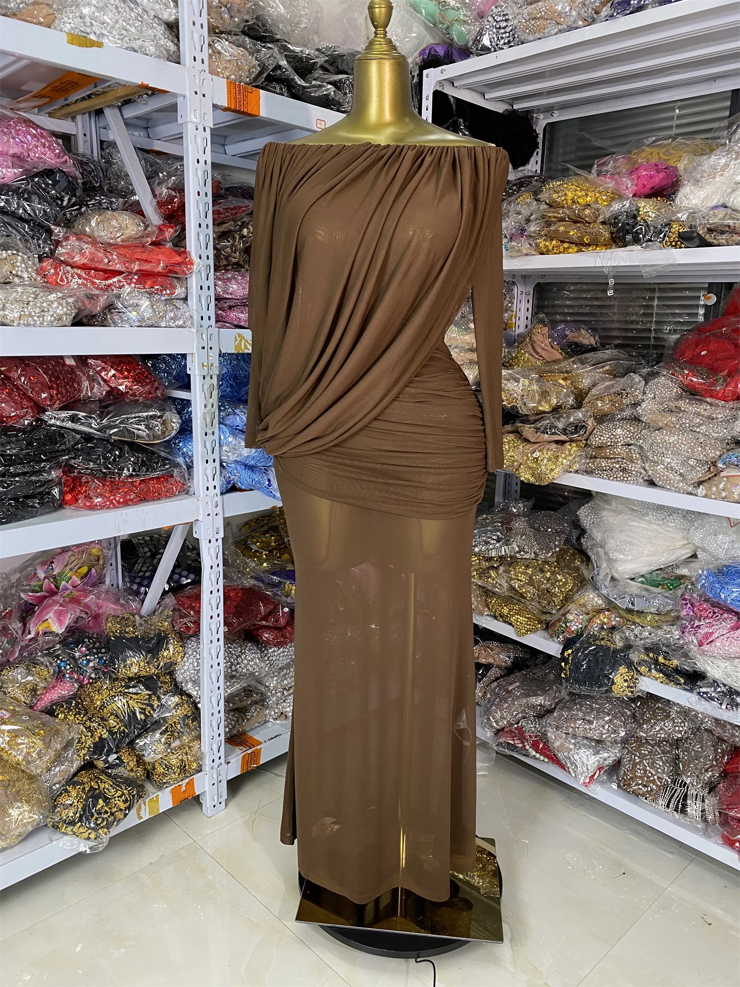 

Оптовая продажа от производителя: Женское коричневое полупрозрачное платье с длинным рукавом и вырезом-лодочкой, мягкое, комфортное, для вечерних мероприятий и торжественных встреч.