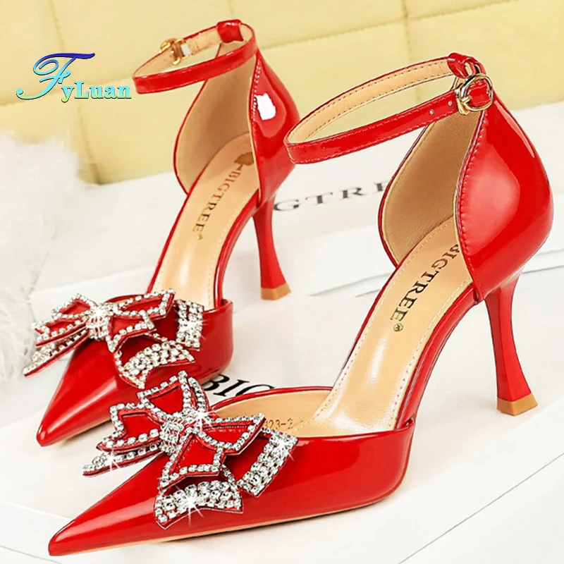 

Red Butterfly Knot 8cm Women Sandals Patent Leather Heels Hollow One Word Buckle Pumps Pointed Rhinestone Stiletto Banquet Shoes