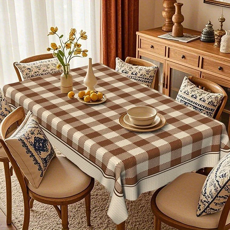 One vintage checked tablecloth, in classic brown and white colors.