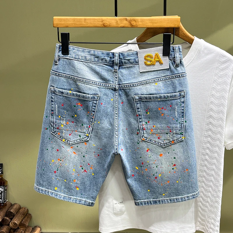 2024 summer new high-end personalized men's denim shorts broken tidal brand elastic Slim embroidery patches spray-painted pants