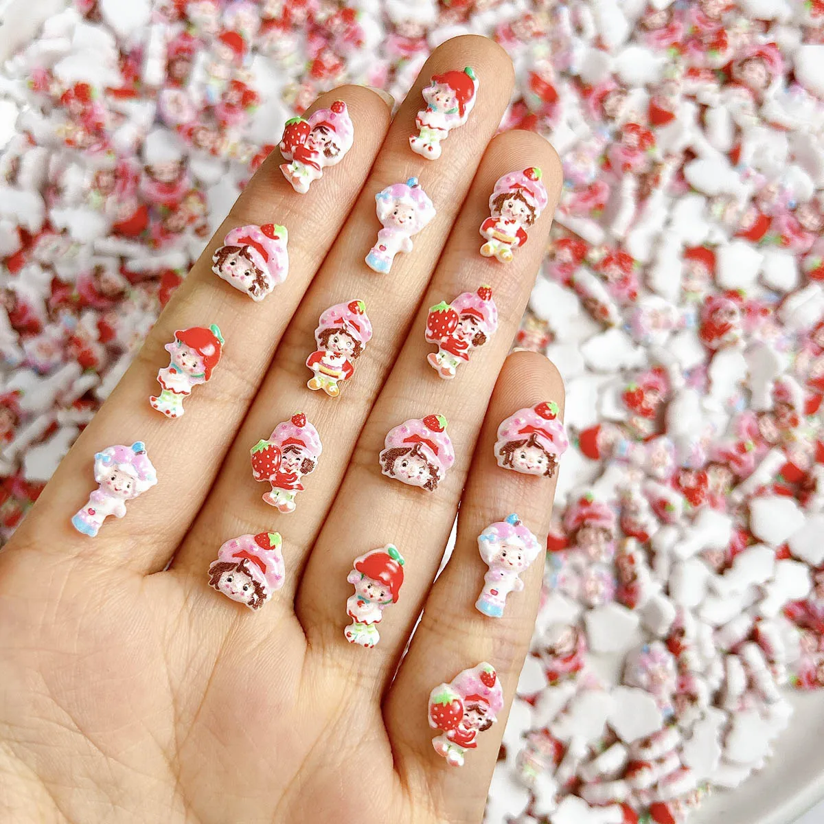 Nuevos dibujos animados adorables fresa chica resina uñas encantos 3D creativo luminoso chica decoración de uñas DIY horquilla suministros para uñas