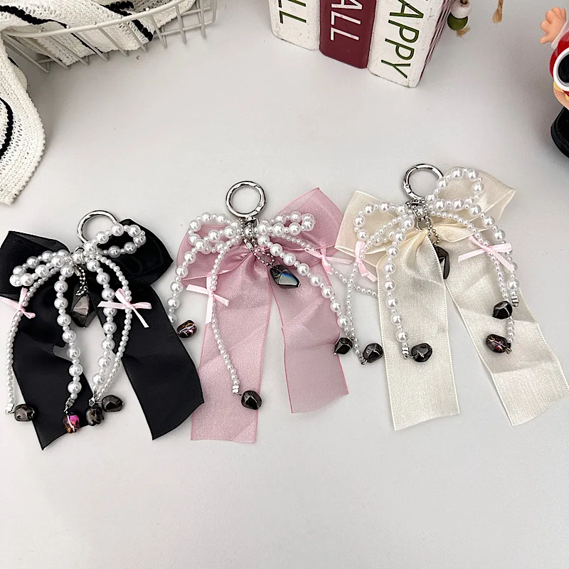 Catena per telefono con fiocco in garza morbida di perle di alta qualità Fascino per borsa per auricolari con fiocco in pizzo stile dolce e fresco nero e rosa