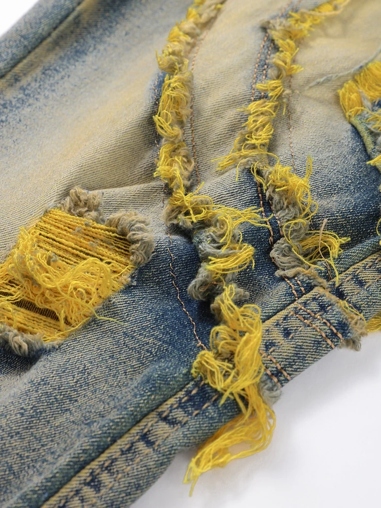 Jeans da uomo patchwork strappati alla moda con cerniera pantaloni in denim a matita slim a vita alta 2025 autunno streetwear maschile