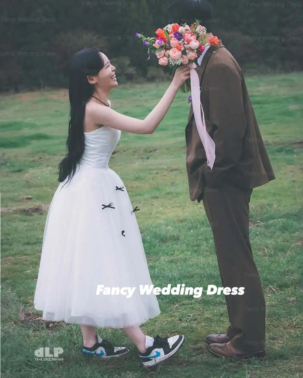 Fantasia carino fiocco staccabile abito da sposa Corea donne servizio fotografico una linea innamorato abito da sposa lunghezza tè corsetto posteriore personalizzato