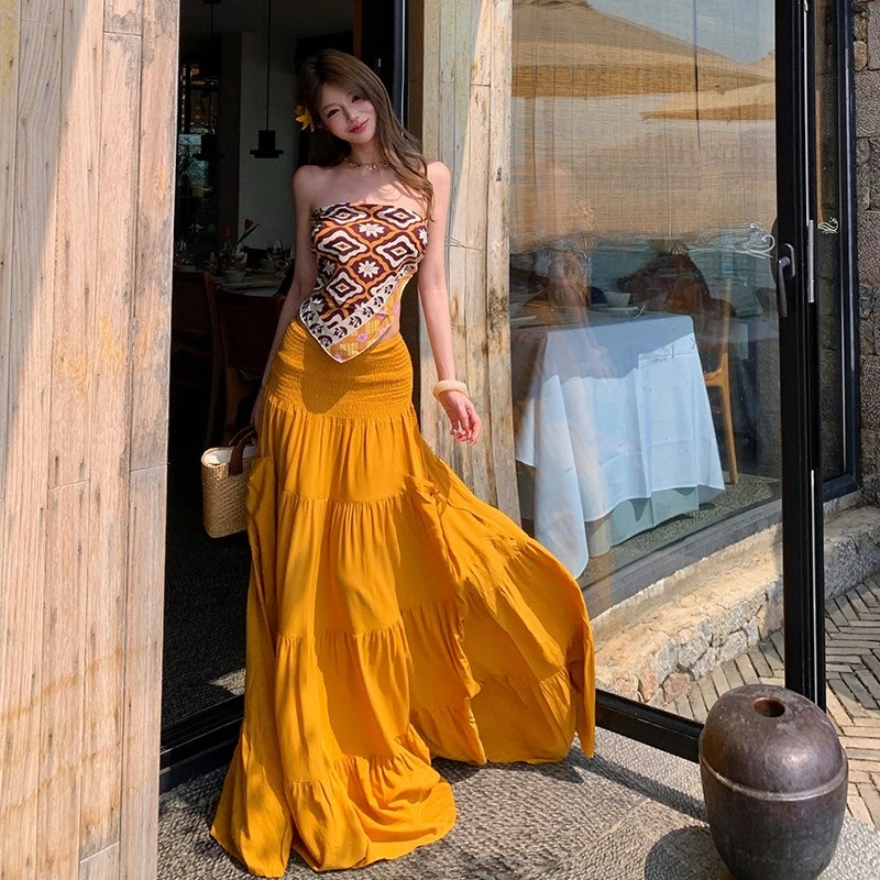 

2026 Summer Retro Vacation Style Hot Selling New Strapless Top and High Waisted Solid Color Long Skirt Two-piece Set