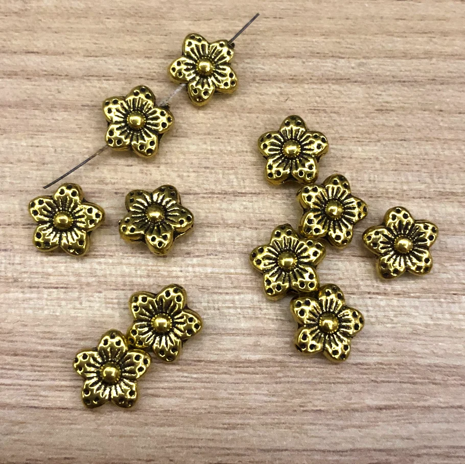 

40pcs 8*8*4mm Lovely flower design sapcer beads handmade accessories Zinc Alloy metal HW2921