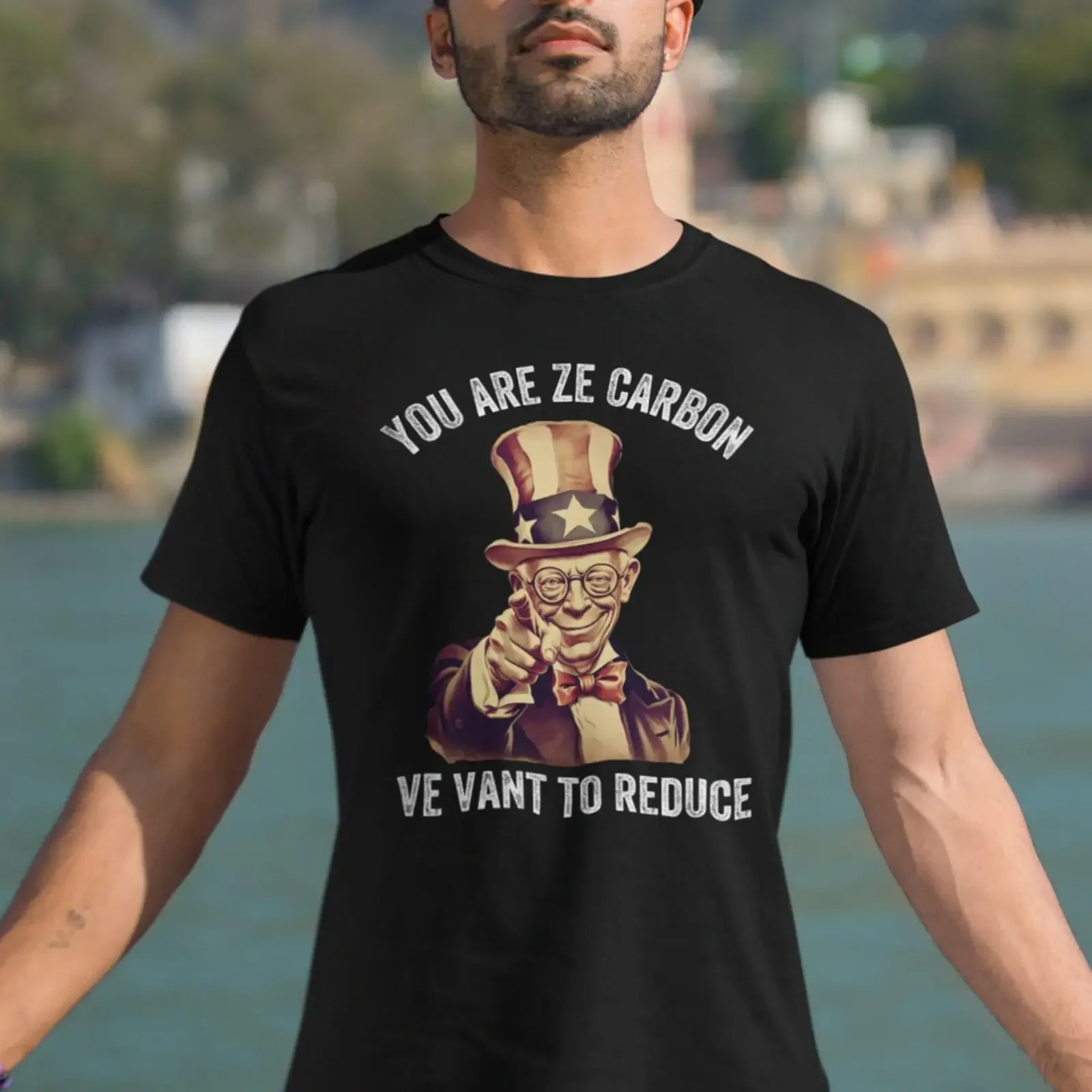 May include A black t shirt with graphic of Uncle Sam pointing and saying You are ze carbon we vant to reduce vintage Washed