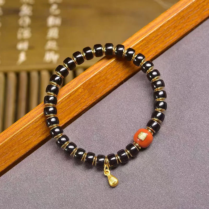 Natural black gold coconut shell bracelet with copper inlay, agate barrel beads, lapis lazuli gourd accessories, and Buddhist be