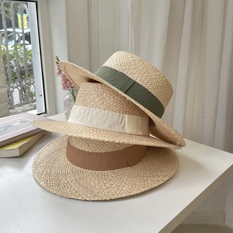 Pure hand-woven raffia flat cap simple fashion color ribbon women\'s hat outdoor beach travel sun hat wholesale spot