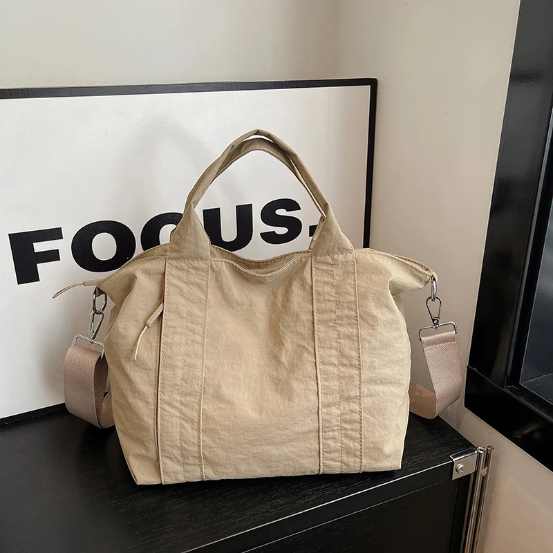 

Японская минималистичная сумка-тоут, универсальная модель 2025 года, большая вместительная холщовая сумка-тоут для женщин, на плечо и через плечо.