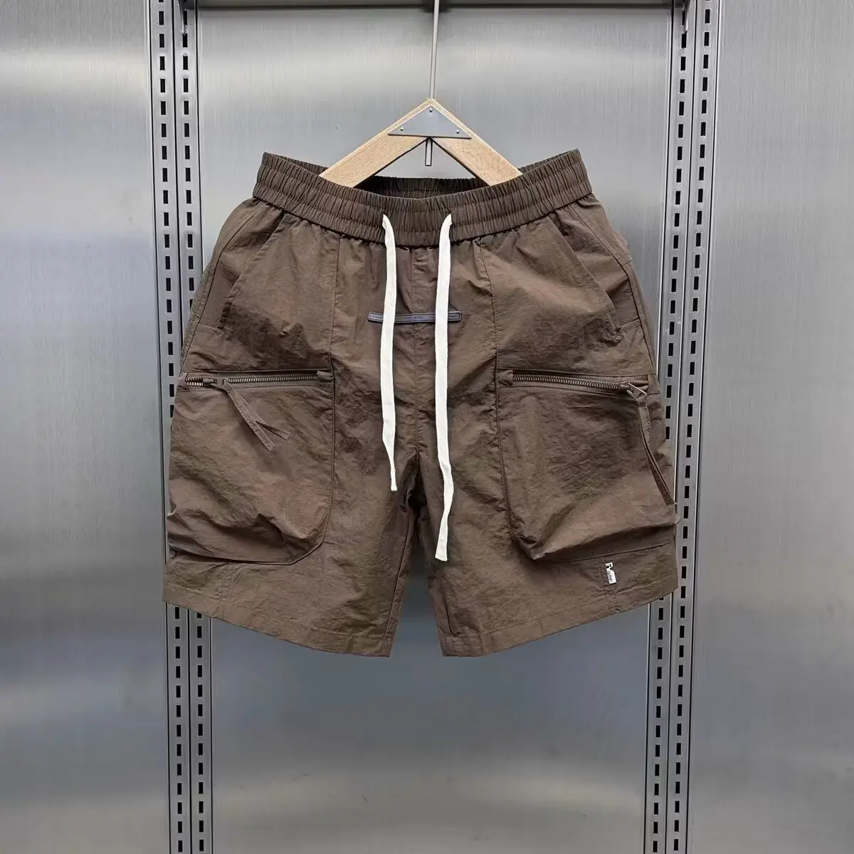 2025 กางเกงขาสั้นฤดูร้อนผู้ชายหลายกระเป๋าน้ําหนักเบาสบายๆกางเกงสําหรับชายยุทธวิธีออกกําลังกายStreetwearกางเกงขาสั้นกลางแจ้ง 401