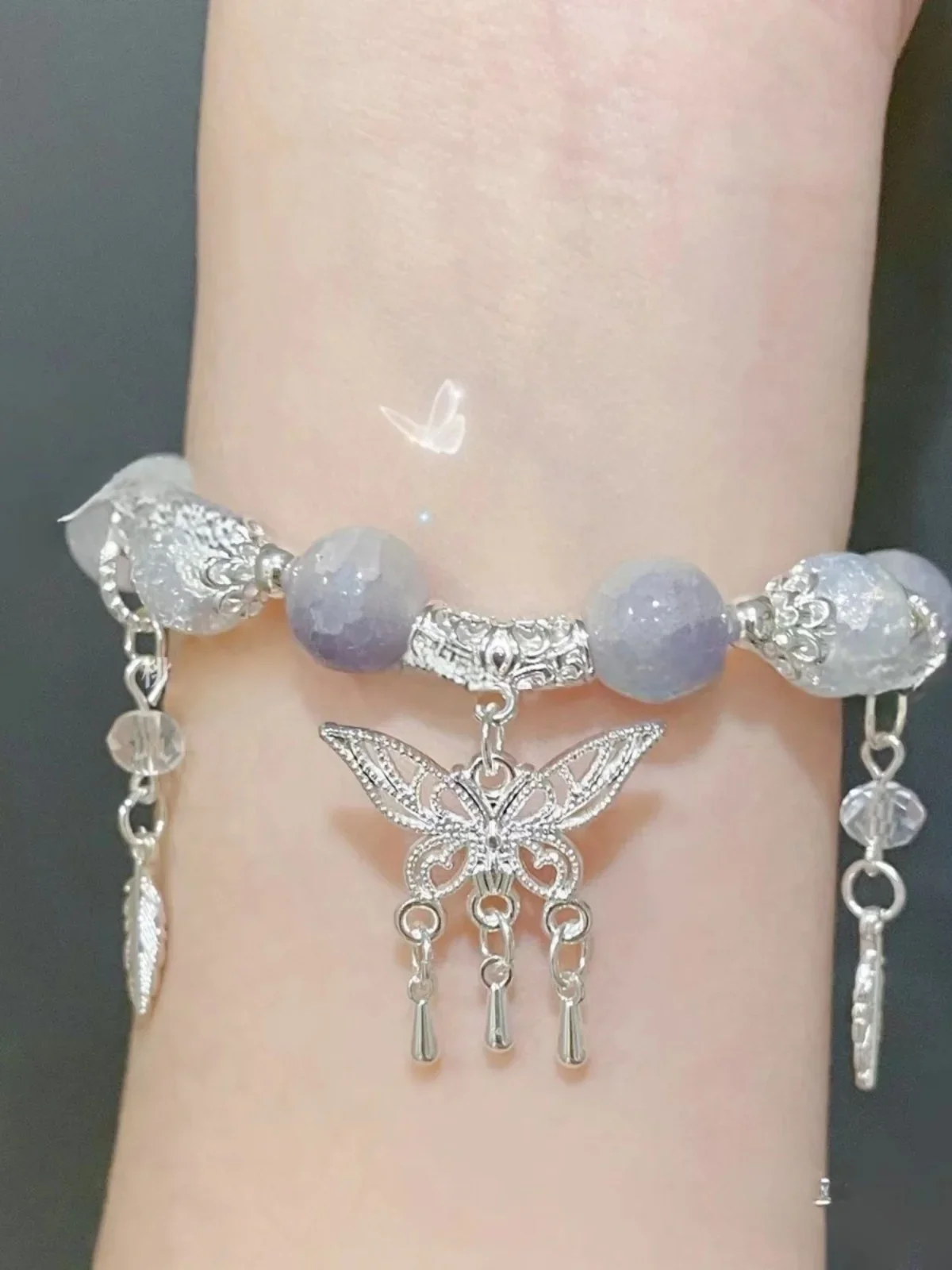 Verschmieren Sie lila Glaskristallperlen