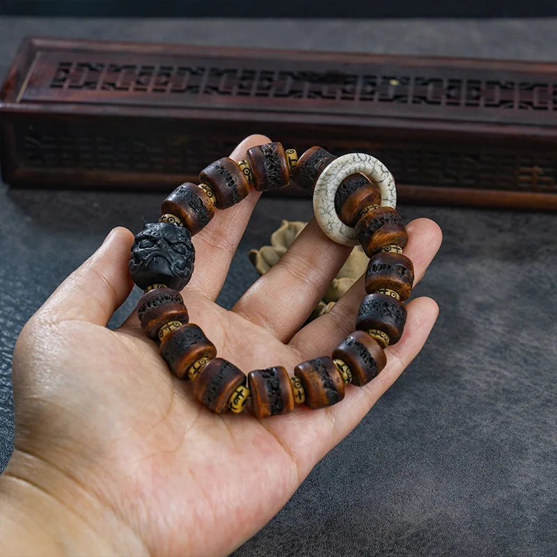 Tibetan-style yak bone bracelet with 14mm , skull , and oil-coated lion beads accessories