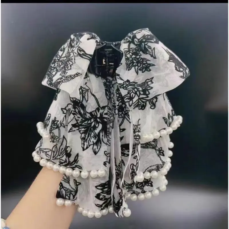 الإناث الصيف الخريف جديد أغطية الرأس اكسسوارات النساء أدوات تصفيف الشعر دبابيس الشعر اللؤلؤ القوس مشبك شعر سيدة مشبك شعر رومانسي