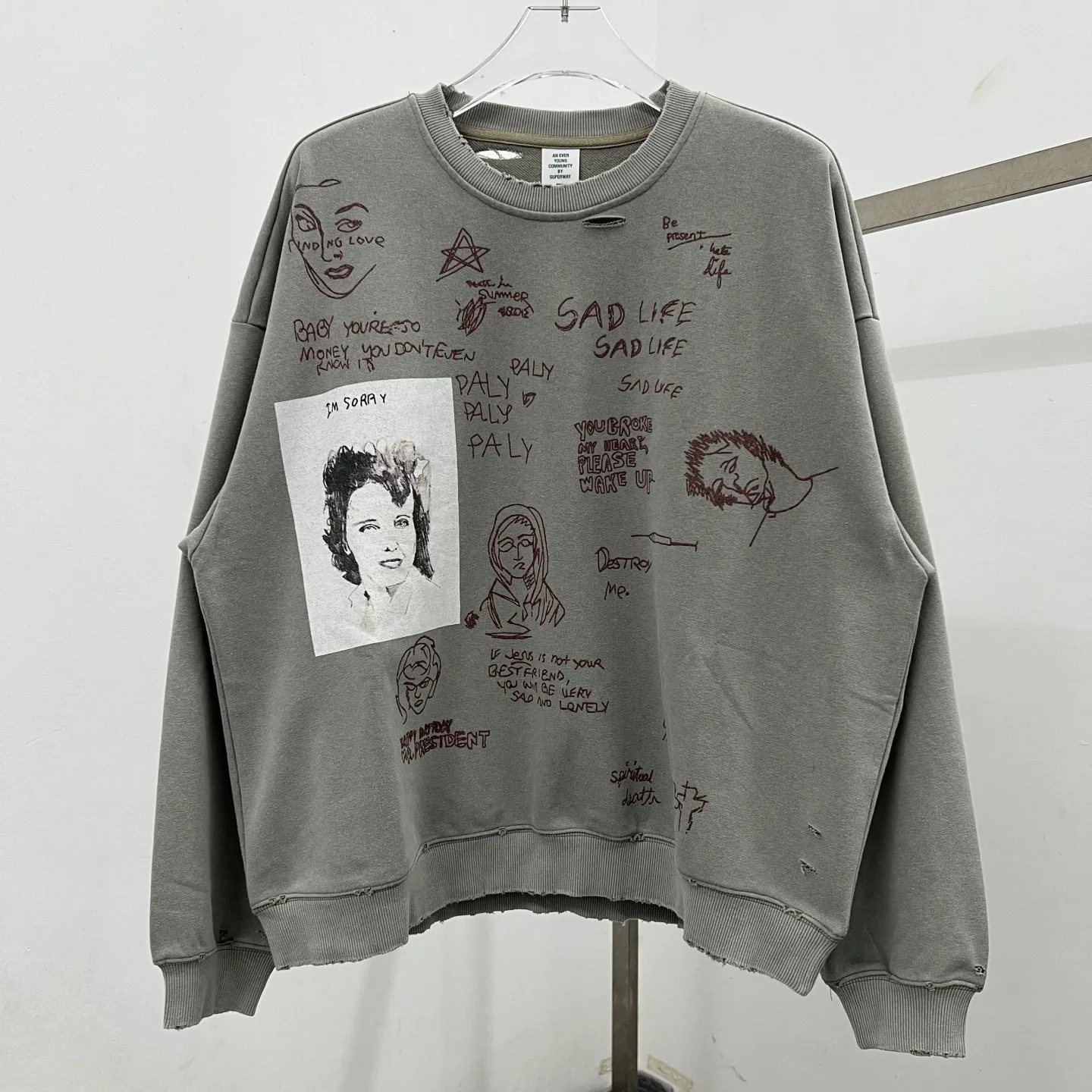 

American Autumn Worn-out Hole Sketch Graffiti Portrait Cotton Sweatshirts Men and Women High Street Hip-hop Retro Couple Jacket