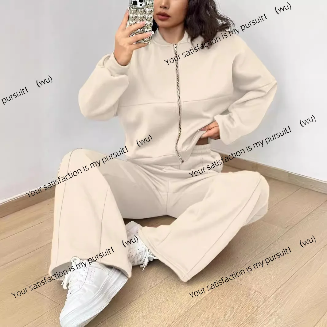 Setelan dua potong sweater fleece musim gugur dan musim dingin wanita tren mode kasual Eropa dan Amerika dengan kardigan ber-resleting dan celana panjang.