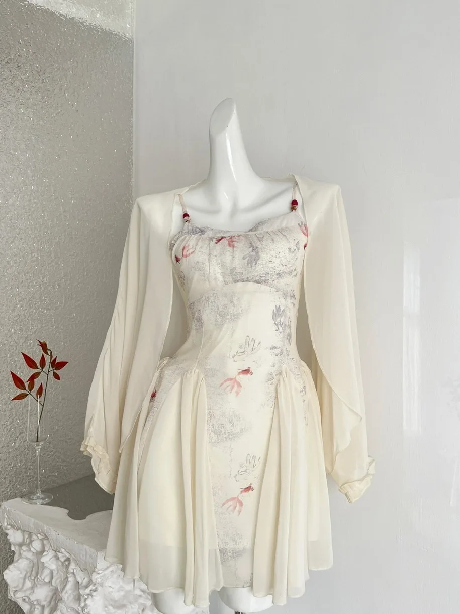 

Весенне-летнее платье с цветочным принтом и бретельками через шею, женский нежный солнцезащитный кардиган, модный тренд, дизайн для узкого круга аудитории