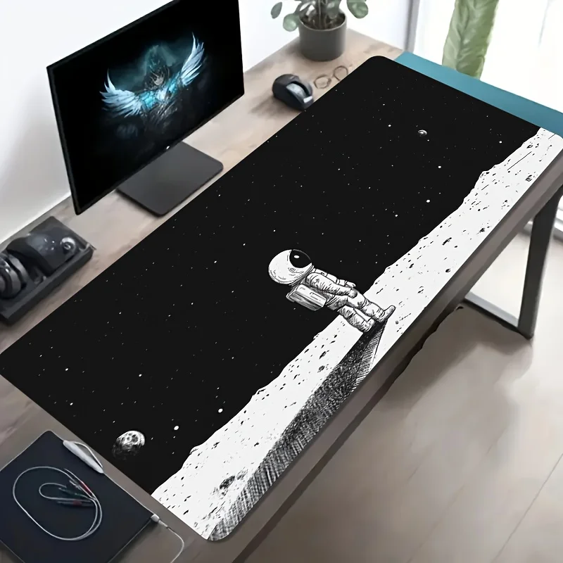 Large-sized Esports Gaming Mouse Pad Featuring an Astronaut Observing Stars on the Moon in a Black and White Illustration.