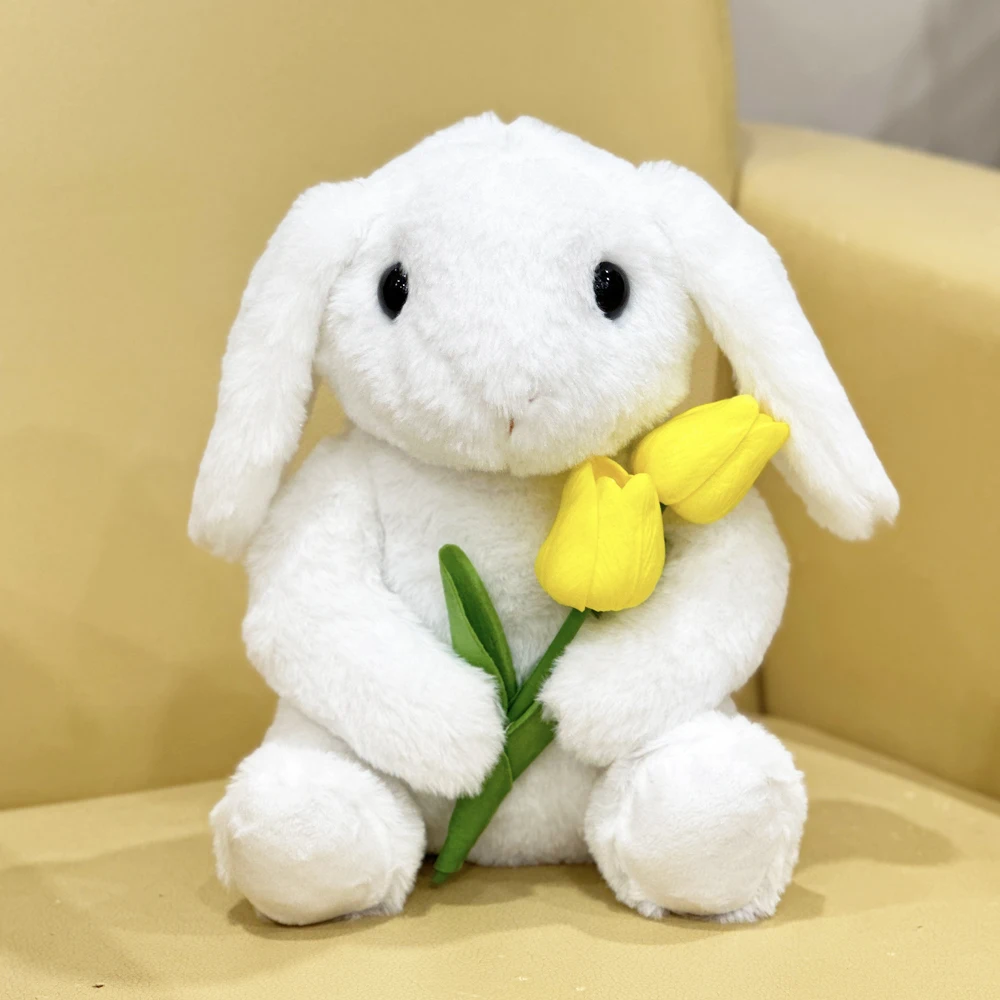 Peluche di coniglio bianco con fiori di tulipano