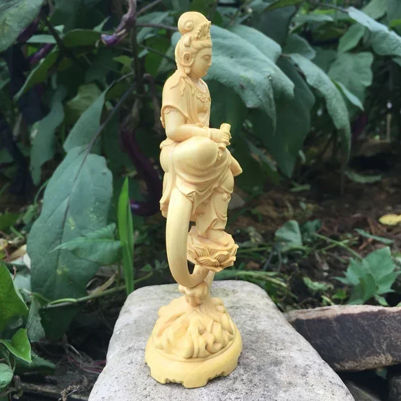 Solid wood wave scroll Lotus Guanyin statue Modern art solid wood carving Home living room room decoration feng shui accessories