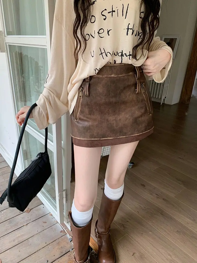 

American Retro Black Pu Leather Skirt Skirt Women Autumn And Winter Hot Girls Skirt High Waist A-Line Hip Short Skirt