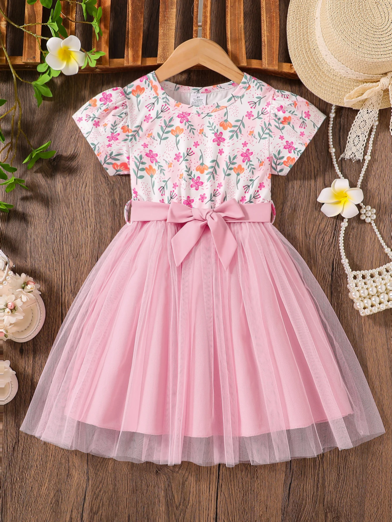 Roupa de verão elegante e simples para meninas, vestido floral de malha com cintura cinched de comprimento médio, roupas infantis doces e energéticas versáteis para o dia das meninas, roupas elegantes e únicas para viagens ao ar livre para meninas