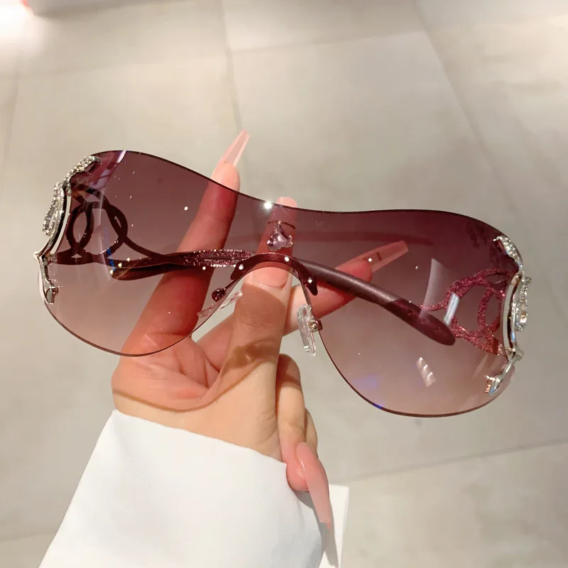 Y2K Rimless Luxury Brand Designer Sunglasses Women For Men One Piece Trendy Oversized Sun Glasses Metal Snake Pink Punk Shades