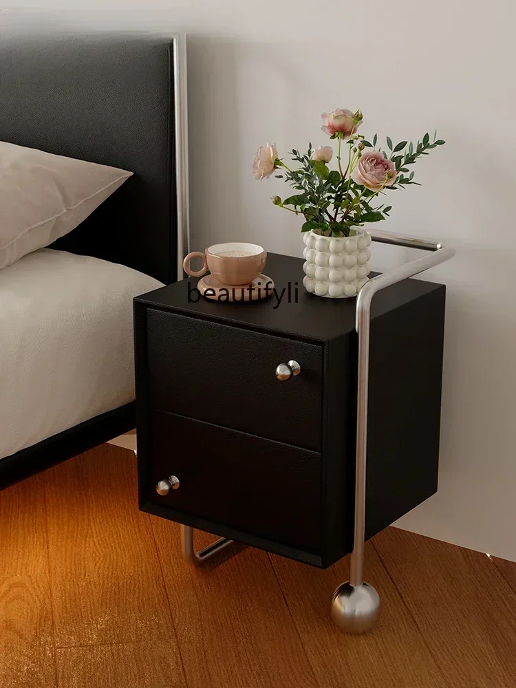 

Italian leather solid wood bedside table, black bedside storage cabinet, simple and removable stainless steel locker