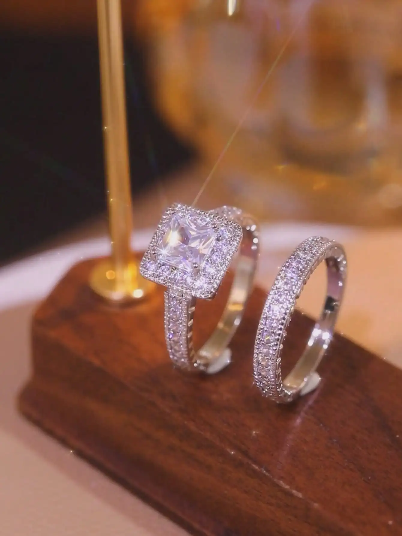 

2Pcs luxury minimalist women's rings. This couple set with sparkling cubic zirconia features a unique design, perfect for weddings, engagements, anniversaries and daily wear. Excellent gifts for various festivals.